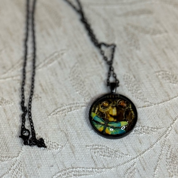 Mechanical or Scientist face and blue butterfly/moth necklace. 24” - Picture 2 of 4